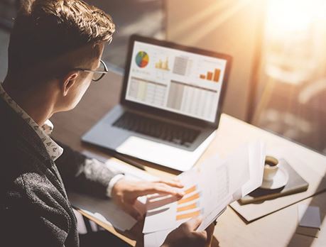 Man studying charts