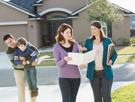 Family with a real estate agent