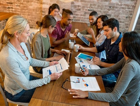 Group of people discussing business at a table