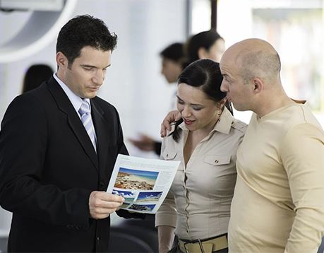 Travel agent helping a couple