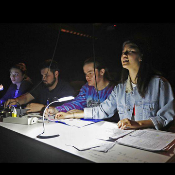 Group of student sitting at a table.