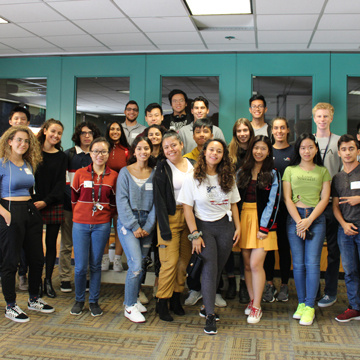 A large group of students at a club meeting