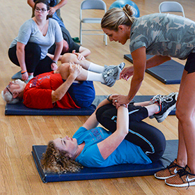 Instructor helping student