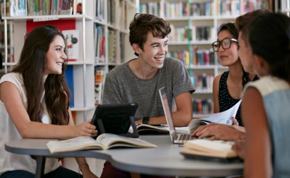 students studying at a table