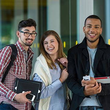 3 students walking together