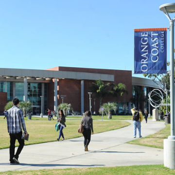 Students visiting information booths in OCC quad